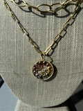 Rainbow sapphire and diamond pendant and on oval 14k chain with lobster clasp