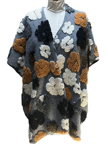 Open cape with floral embellishment