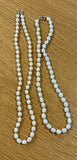 Sea Pearl necklace hand knitted with Tiffany blue silk 14K yellow gold clasp