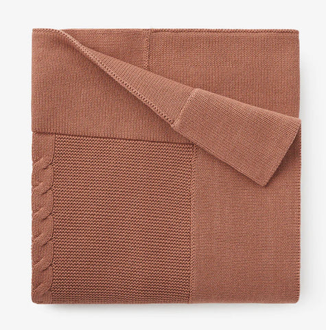 Garter stitch sweater knit baby blanket in copper