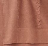 Garter stitch sweater knit baby blanket in copper