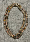 Beaded semi precious Multi tones of pinks, greens and blues necklace hand knotted light blue silk with 14K yellow gold clasp