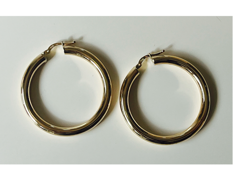 1.5”. 4mm 14k yellow gold chubby hoop earrings