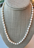 Sea Pearl necklace hand knitted with Pale pink silk 14K yellow gold clasp